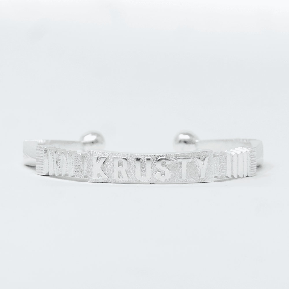 Photo principale sur fond neutre, vue de face nette du bracelet Jonc KRUSTY Argent en argent massif 925 (poincon 925), signe WB Paris (Westaff Bijouterie). Jonc rigide a la surface lisse et polie, fermeture discrete, port au poignet. Bijou unisexe homme et femme, ideal en cadeau. Recherches : bracelet argent 925, bracelet argent homme, gourmette argent, achat bijou argent pas cher. Argent 925 hypoallergenique, agreable a porter au poignet. Livraison rapide et garantie a vie WB Paris.