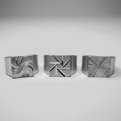 Chevalières aluminium Le Tirage : motifs Spirale, Hélice et Rayon